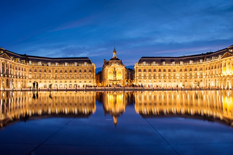 Place la Bourse in Bordeaux, the water mirror by night, France